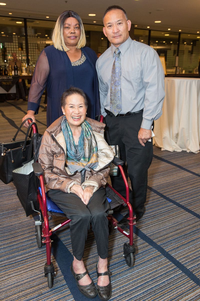 Photo of Lorene Lee and her husband Tony with caregiver at 2018 Champions